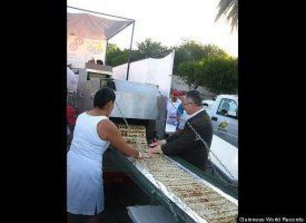 - The largest burrito weighed 12,785.576 pounds and was achieved by CANIRAC La Paz, in La Paz, Baja California Sur, Mexico, on Nov. 3. The burrito was made from one single flour tortilla that weighed over 2 tons and measured 2.4 kilometers. The filling was fish with onion, chile and refried beans -- typical to the region of Baja California Sur. Fifty-four restaurants took part, with about 3,000 volunteers.