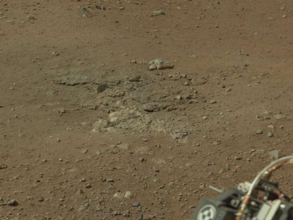 Goulburn Scour Mark - This cropped image from NASA's Curiosity rover shows one set of marks on the surface of Mars where blasts from the descent-stage rocket engines blew away some of the surface material. This particular scour mark is near the rear left wheel of the rover and is the left-most scour mark on the left side of this larger panorama from Curiosity's Mast Camera (see PIA16051). This scour mark is named Goulburn after a 2-billion year-old sequence of rocks in northern Canada.
