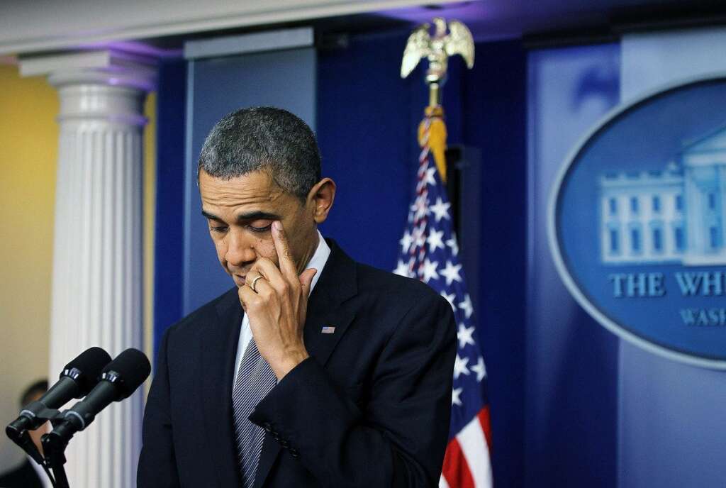 Sandy Hook Elementary School Shooting - WASHINGTON, DC - DECEMBER 14:  U.S. President Barack Obama wipes tears as he makes a statement in response to the elementary school shooting in Connecticut December 14, 2012 at the White House in Washington, DC. According to reports, there are 27 dead, 20 of them children, after Adam Lanza opened fire at the Sandy Hook Elementary School in Newtown, Connecticut. Reports say that Lanza died at the scene.