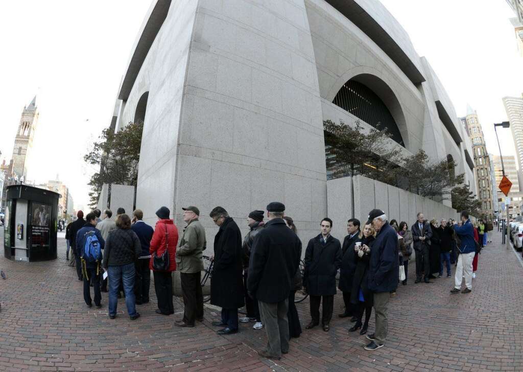 US - VOTE - 2012 - BOSTON - Voters line up to cast their vote at the Boston Public Library  November 6, 2012 in Boston, Massachusetts.  The final national polls showed an effective tie, with either US President Barack Obama or Republican challenger Mitt Romney favored by a single point in most surveys. AFP PHOTO / TIMOTHY A. CLARY        (Photo credit should read TIMOTHY A. CLARY/AFP/Getty Images)