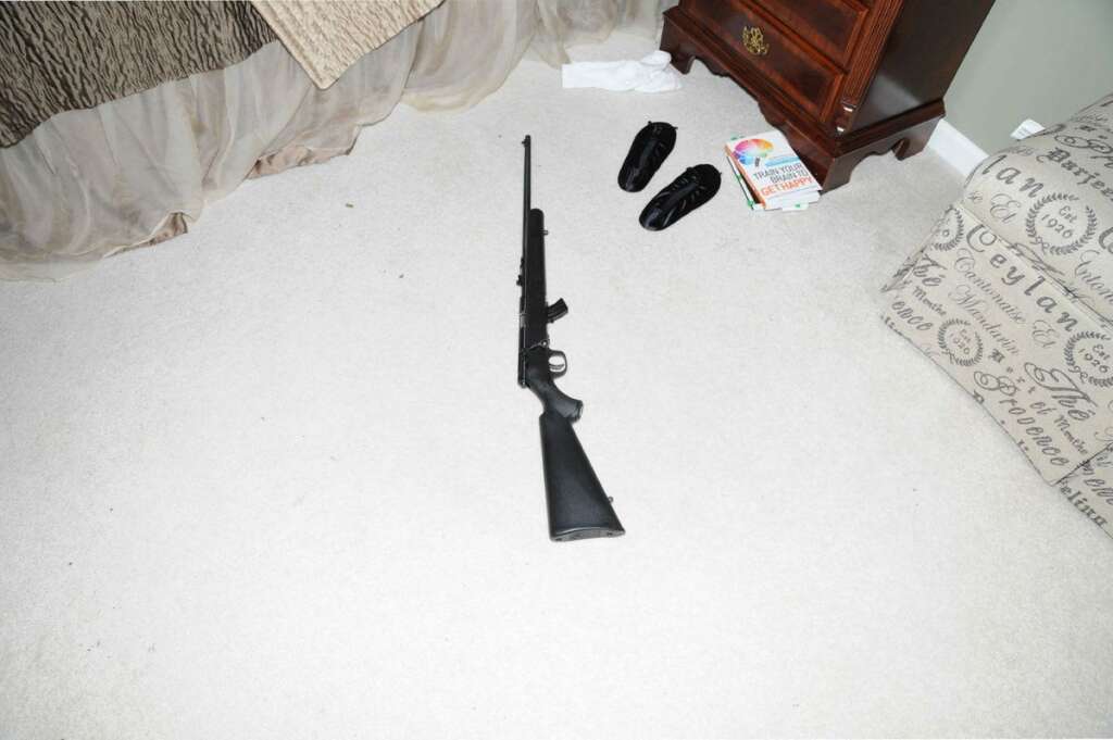 Second Report On Sandy Hook Shootings Released - NEWTOWN, CT - UNSPECIFED DATE: In this handout crime scene evidence photo provided by the Connecticut State Police, shows a rifle in the master bedroom in the suspect's house on Yogananda St. following the December 14, 2012 shooting rampage at Sandy Hook Elementary School, taken on an unspecified date in Newtown, Connecticut. A second report was released December 27, 2013 by Connecticut State Attorney Stephen Sedensky III gave more details of the the Newtown school shooting by Adam Lanza that left 20 children and six women educators dead inside Sandy Hook Elementary School after killing his mother at their home.  (Photo by Connecticut State Police via Getty Images)