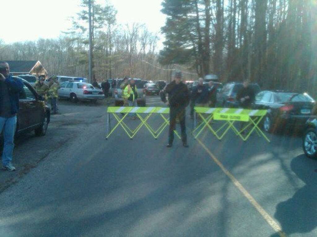 Sandy Hook Elementary School Shooting - Swarms of parents are crowding around cordoned-off sections of Sandy Hook Elementary School in Newtown.