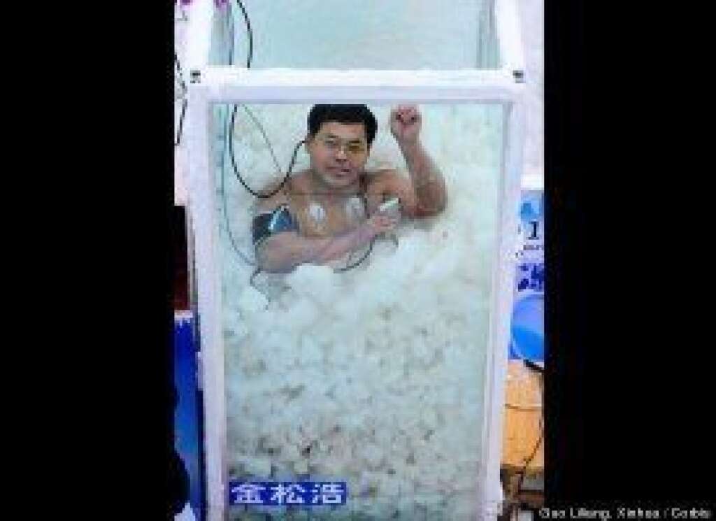 - Chinese "Iceman" Jin Songhao stands in a plastic box during a cold endurance competition in Zhangjiajie, central China's Hunan Province, on Jan. 3. Jin Songhao dwarfed Wim Hof's world record for the longest ice bath by immersing himself in ice for 120 minutes wearing nothing but a swimsuit.