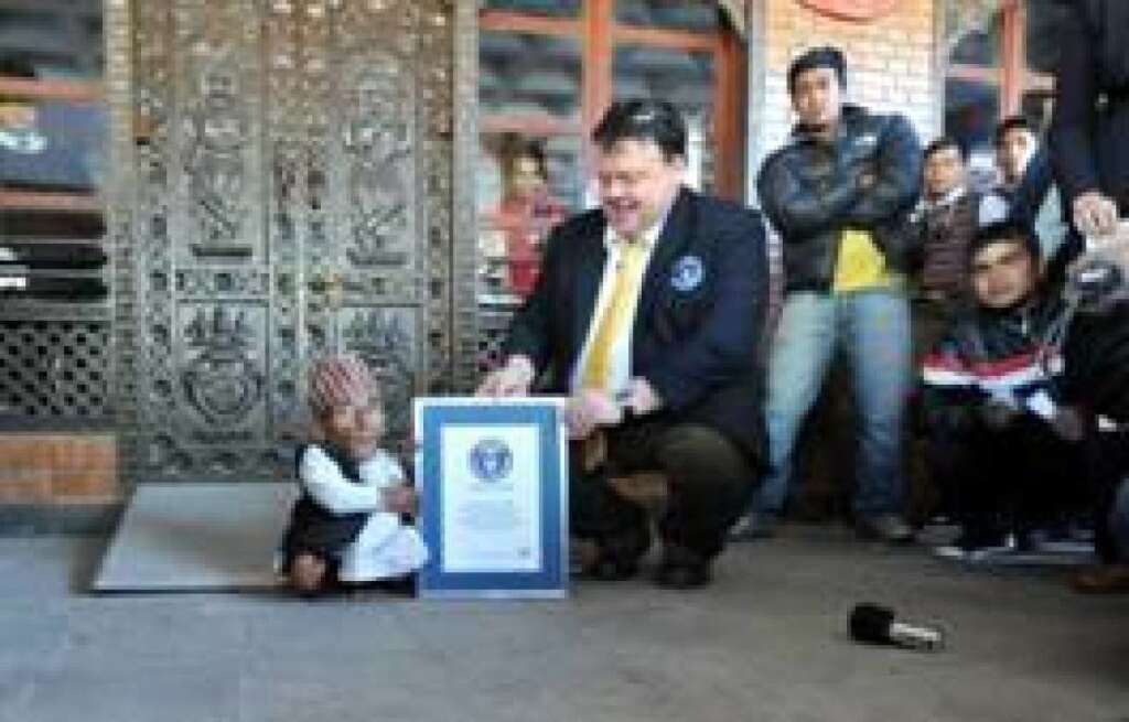 Chandra Bahadur Dangi - It's official! Guinness World Records officials have measured Chandra Bahadur Dangi to confirm his height of 21.5 inches (54.6 centimeters). That makes him not only the world's shortest living man but the world's shortest person ever recorded in Guinness' 57-year history.