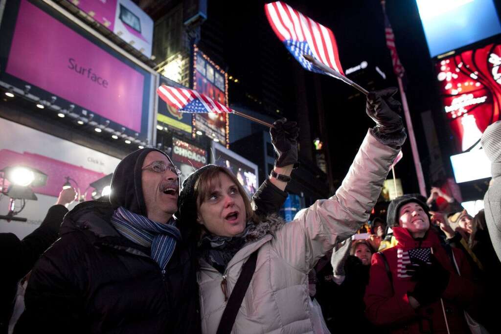 A Times Square à New York... - ...on fête la victoire d'Obama