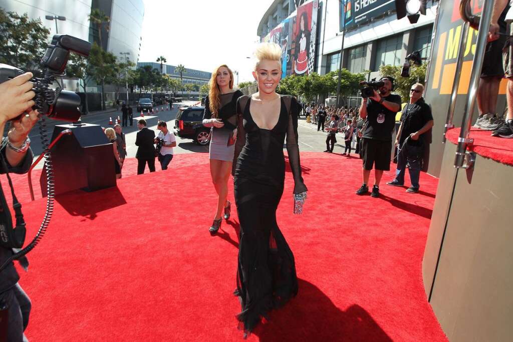 Miley Cyrus - Singer-actress Miley Cyrus arrives at the MTV Video Music Awards on Thursday, Sept. 6, 2012, in Los Angeles. (Photo by Matt Sayles/Invision/AP)
