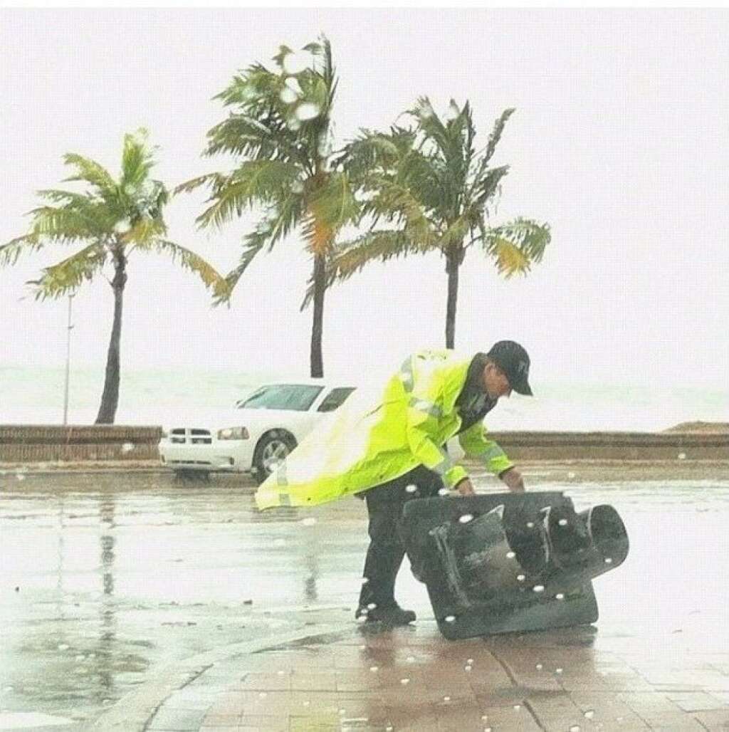 - A safety aide moves a fallen traffic light in Fort Lauderdale, Fl. (CREDIT: Instagram user <a href="http://ipv6.statigr.am/p/267368560300175217_52109906" target="_hplink">@sasspants327</a>)