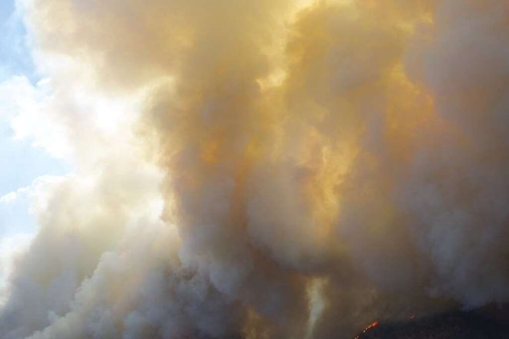 Waldo Canyon Wildfire - Fire from the Waldo Canyon wildfire as it moved into subdivisions and destroyed homes in Colorado Springs, Colo., on Tuesday, June 26, 2012. (AP Photo/Gaylon Wampler)