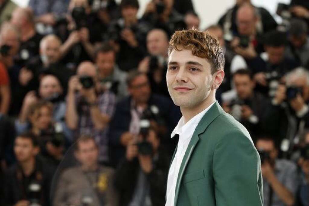Le style coloré de Xavier Dolan - Director Xavier Dolan poses during a photo call for Mommy at the 67th international film festival, Cannes, southern France, Thursday, May 22, 2014. (AP Photo/Alastair Grant)