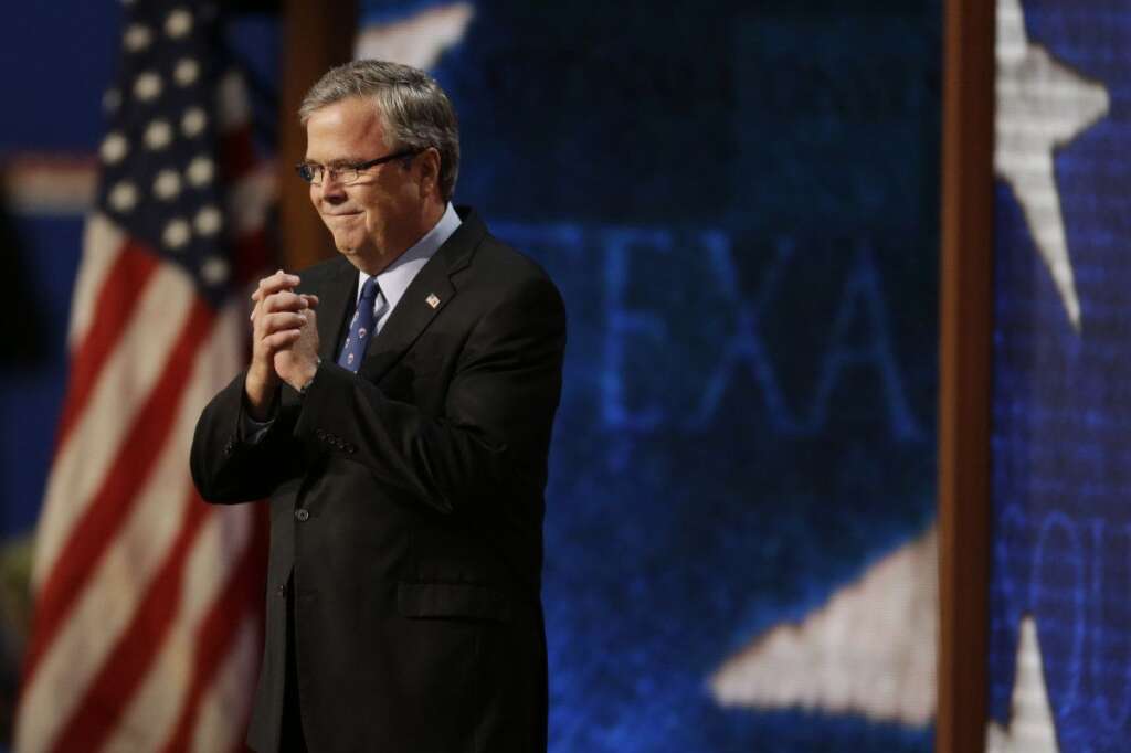 Former Florida Governor Jeb Bush steps onstage to speak to delegates at the Republican National Convention in Tampa, Fla., on Thursday, Aug. 30, 2012. (AP Photo/Lynne Sladky)