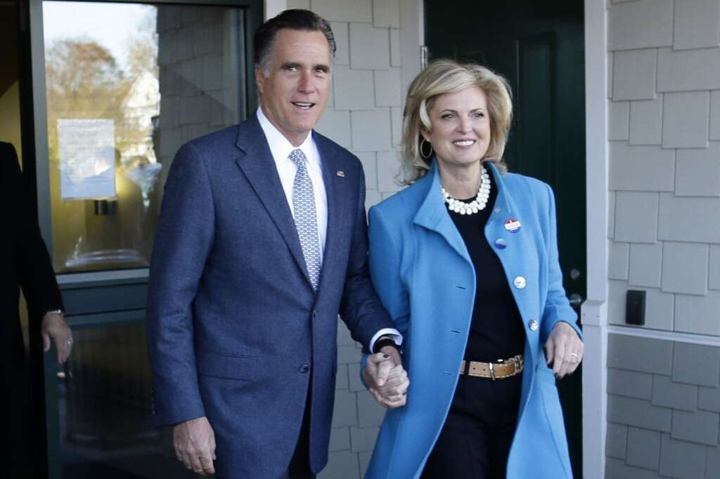 Mitt Romney - Republican presidential candidate, former Massachusetts Gov. Mitt Romney and his wife Ann Romney emerge after they voted in Belmont, Mass., Tuesday, Nov. 6, 2012. (AP Photo/Charles Dharapak)