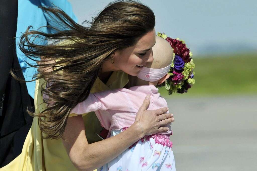 The Duchess of Cambridge hugs six-year-old Diamond Marshall as the Royal Couple arrives in Calgary Thursday, July 7, 2011. -  The Duchess of Cambridge hugs six-year-old Diamond Marshall as the Royal Couple arrives in Calgary Thursday, July 7, 2011.