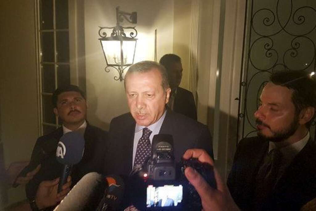 Turkish President Tayyip Erdogan speaks to media in the resort town of Marmaris, Turkey, July 15, 2016.    REUTERS/Kenan Gurbuz