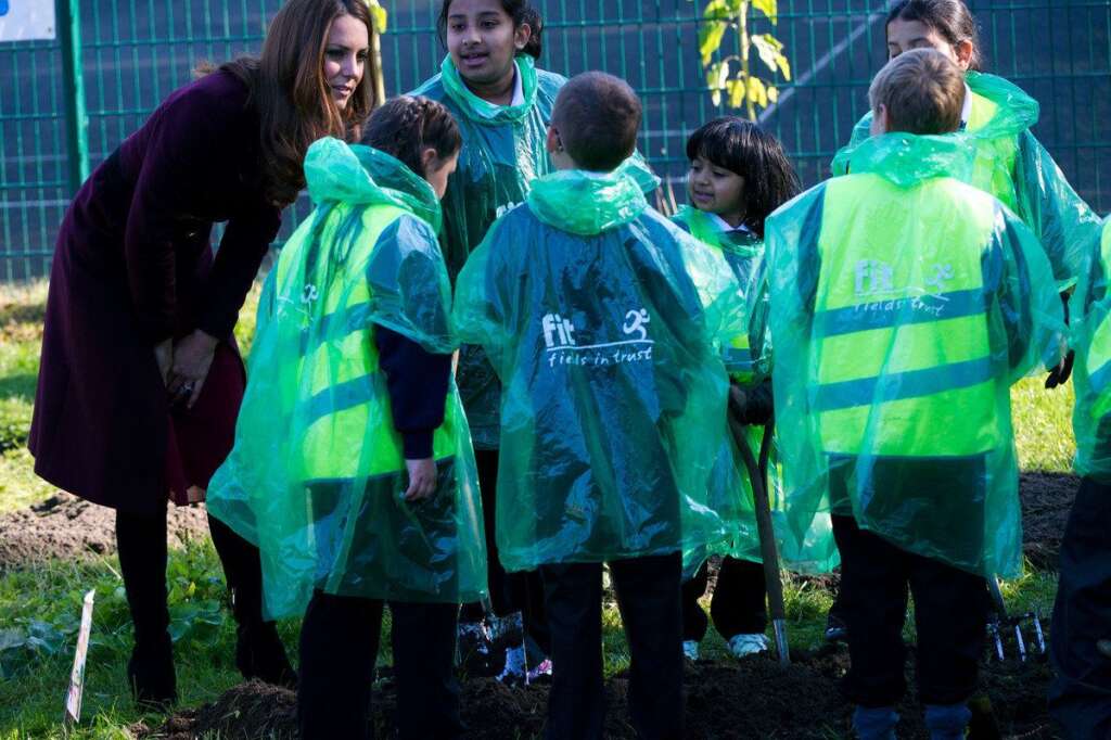 The Duke & Duchess Of Cambridge Visit Newcastle - NEWCASTLE UPON TYNE, UNITED KINGDOM - OCTOBER 10:  Catherine, Duchess of Cambridge meets children as she visits Elswick Park where she visited a community garden on October 10, 2012 in Newcastle Upon Tyne, England. (Photo by Samir Hussein/Getty Images)