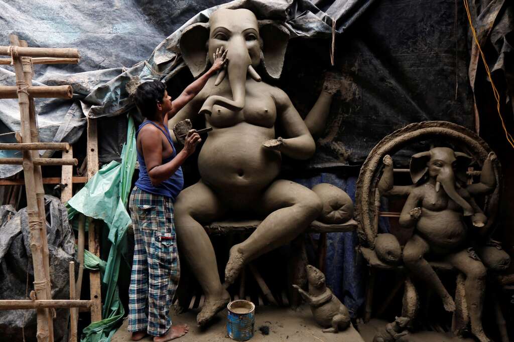 - An artisan makes an idol of Hindu god Ganesh at a workshop ahead of the Ganesh Chaturthi festival celebrations, in Kolkata, India, August 29, 2016.