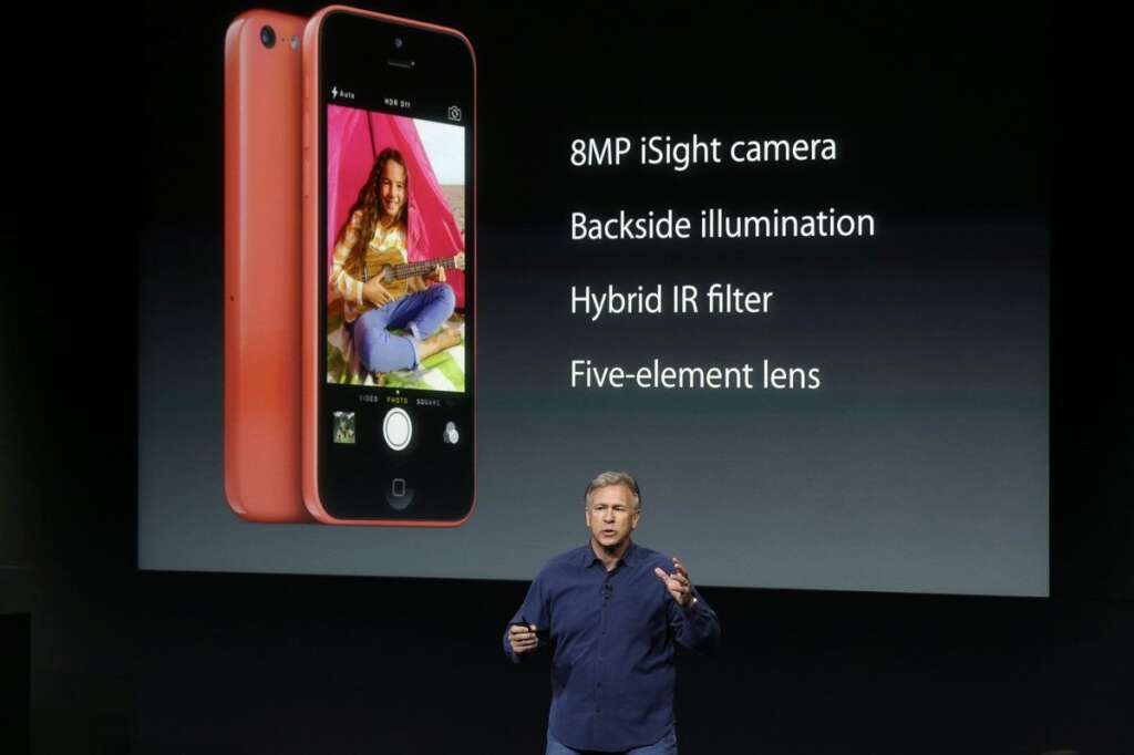 Keynote Apple - Phil Schiller, Apple's senior vice president of worldwide product marketing, speaks on stage during the introduction of the new iPhone 5c in Cupertino, Calif., Tuesday, Sept. 10, 2013. (AP Photo/Marcio Jose Sanchez)