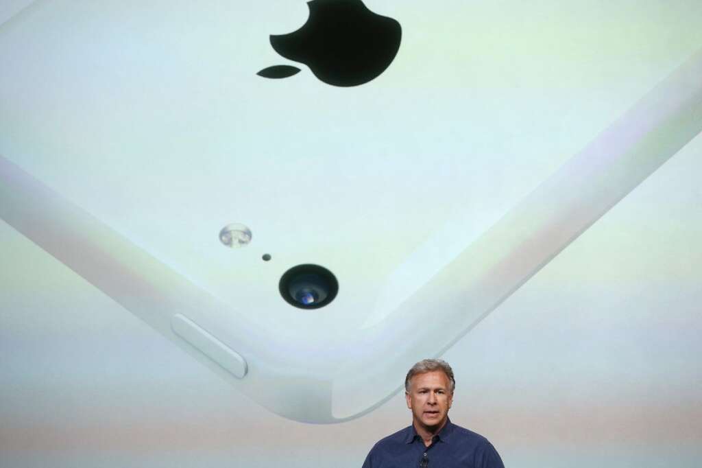 Apple Introduces Two New iPhone Models At Product Launch - CUPERTINO, CA - SEPTEMBER 10:  Apple Senior Vice President of Worldwide Marketing at Phil Schiller speaks about the new iPhone 5C during an Apple product announcement at the Apple campus on September 10, 2013 in Cupertino, California. The company launched the new iPhone 5C model that will run iOS 7  is made from hard-coated polycarbonate and comes in various colors.  (Photo by Justin Sullivan/Getty Images)