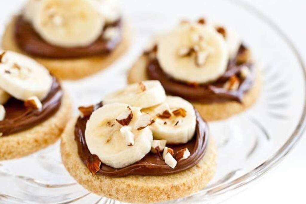 Shortbread Cookies With Nutella, Banana And Almonds - <strong>Get the <a href="http://steamykitchen.com/11382-shortbread-cookies-with-nutella-banana-and-almonds.html" target="_hplink">Shortbread Cookies with Nutella, Banana and Almonds recipe</a> by Steamy Kitchen</strong>