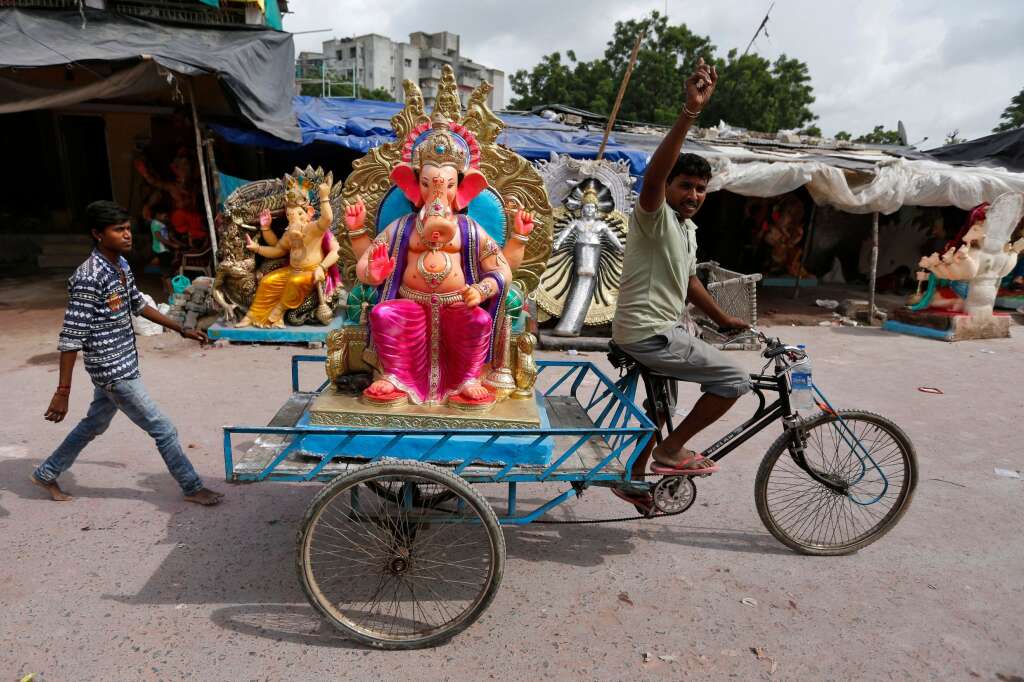 - An idol of the Hindu god Ganesh, the deity of prosperity, is transported to a place of worship on the first day of the Ganesh Chaturthi festival in Ahmedabad, India, September 5, 2016.