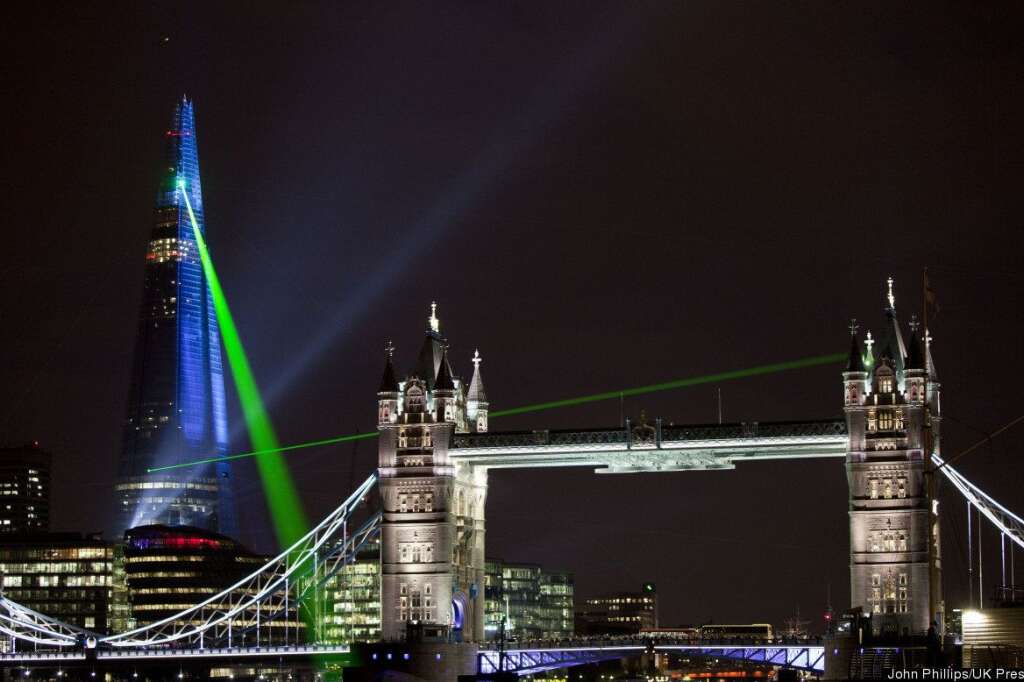 Shard Inauguration - London - A laser show projected from the Shard skyscraper on the South Bank, London, seen from Parliament Hill, marking the completion of the exterior of the building, with work on the inside expected to continue into 2013 and following the official inauguration of the skyscraper earlier today.