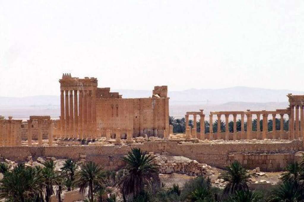 Mideast Syria Palmyra - This photo released on Sunday, May 17, 2015, by the Syrian official news agency SANA, shows the general view of the ancient Roman city of Palmyra, northeast of Damascus, Syria. A Syrian official said on Sunday that the situation is "fully under control" in Palmyra despite breaches by Islamic State militants who pushed into the historic town a day earlier. (SANA via AP)
