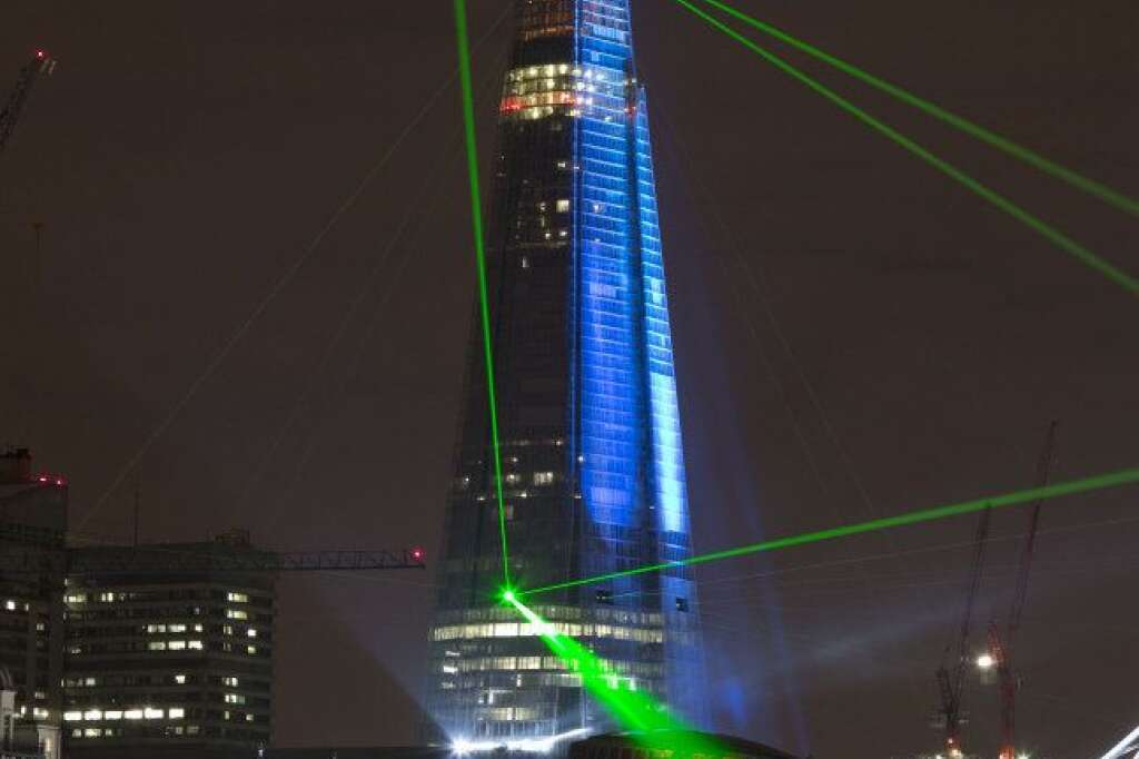 Shard Inauguration - London - The Shard skyscraper lit up by a laser light show to celebrate the inauguration of Europe's tallest building, designed by Italian architect Renzo Piano.
