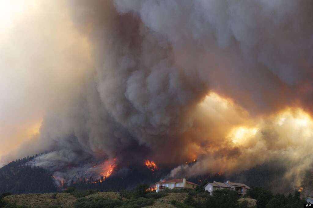 Waldo Canyon Wildfire - Fire from the Waldo Canyon wildfire burns as it moved into subdivisions and destroyed homes in Colorado Springs, Colo., on Tuesday, June 26, 2012. (AP Photo/Gaylon Wampler)