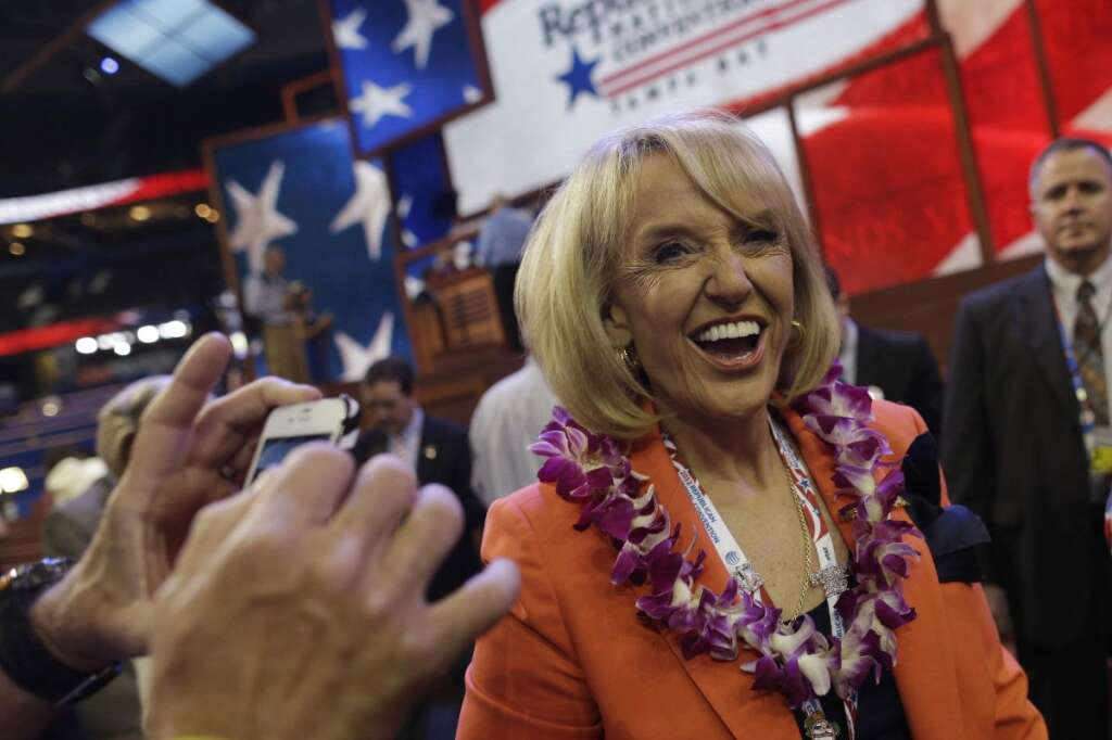 Jan Brewer - Arizona Gov. Jan Brewer arrives on the floor at the Republican National Convention in Tampa, Fla., on Tuesday, Aug. 28, 2012. (AP Photo/Charles Dharapak)