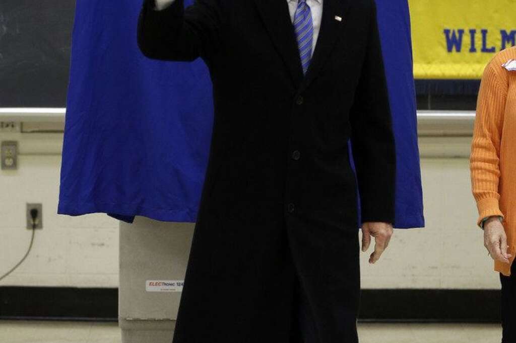Joe Biden - Vice President Joe Biden waves as he exits a voting booth after casting his ballot at Alexis I. duPont High School, Tuesday, Nov. 6, 2012, in Greenville, Del. (AP Photo/Matt Rourke)