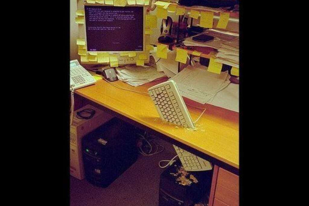Keyboard Through Desk - This is a beautiful metaphor for commerce or something. (via <a href="http://www.graphicshunt.com/funny/images/office-13091.htm" target="_hplink">Graphics Hunt</a>)