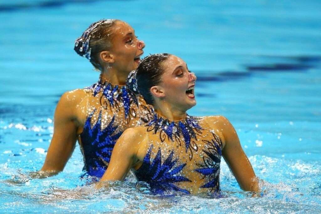 Les visages de la nage synchronisée - Les Britanniques Olivia Federici et Jenna Randall  (Al Bello / Getty Images)