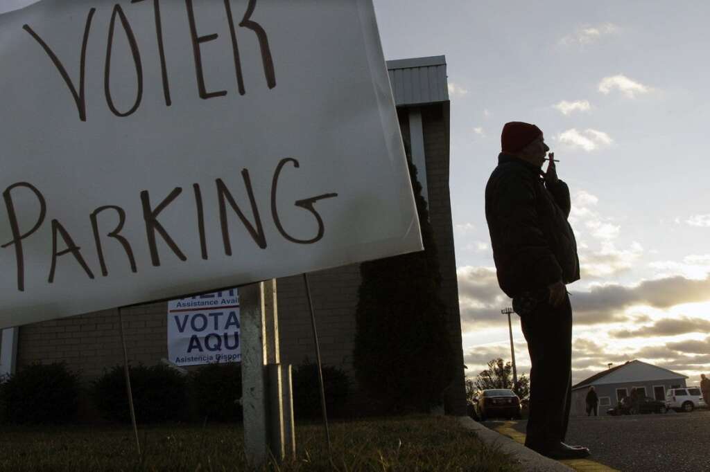 Don Dunkelburger - Don Dunkelburger, of Seaside Heights, N.J., takes a smoke break outside a shelter and polling station at Toms River East High School Tuesday, Nov. 6, 2012. Dunkelburger, who lost his home and was staying in the shelter, said he was not clear on where he was supposed to vote Tuesday. (AP Photo/Mel Evans)