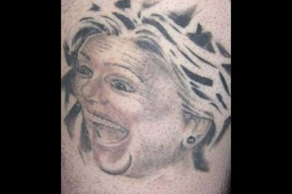 Hillary Clinton - This is what happens when you ask for a tattoo that nobody else in the world has.    More on this <a href="http://www.philly.com/philly/blogs/entertainment/celebrities_gossip/Philly_tattoo_artist_gets_Hillary_tattoo_Hillary_camp_wont_discuss_it.html" target="_hplink">here</a>.