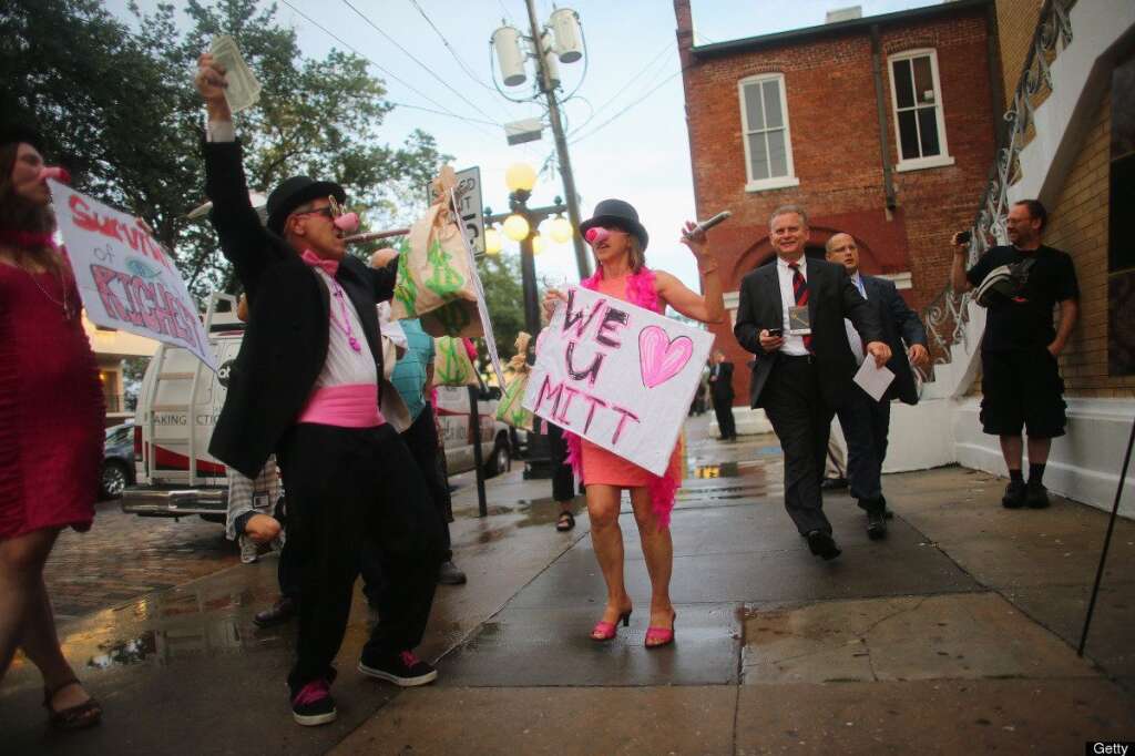 Protesters Demonstrate During The Republican National Convention - TAMPA, FL - AUGUST 27:  Code Pink protesters goad people waiting in line to enter Ybor City's Cuban Club which is reported to be hosting a party attended by U.S. Sen. Marco Rubio (R-FL), former Florida Governor Jeb Bush and others as the Republican National Convention is set to begin on August 27, 2012 in Tampa, Florida. The Code Pink demostrators were accusing the people attending the party of being rich as well as supporters of presumptive Republican presidential nominee, former Massachusetts Governor Mitt Romney.  (Photo by Joe Raedle/Getty Images)