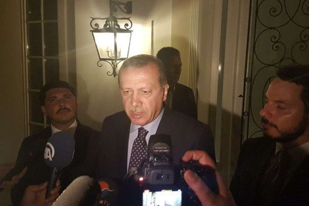 Turkish President Tayyip Erdogan speaks to media in the resort town of Marmaris, Turkey, July 15, 2016.    REUTERS/Kenan Gurbuz  TPX IMAGES OF THE DAY
