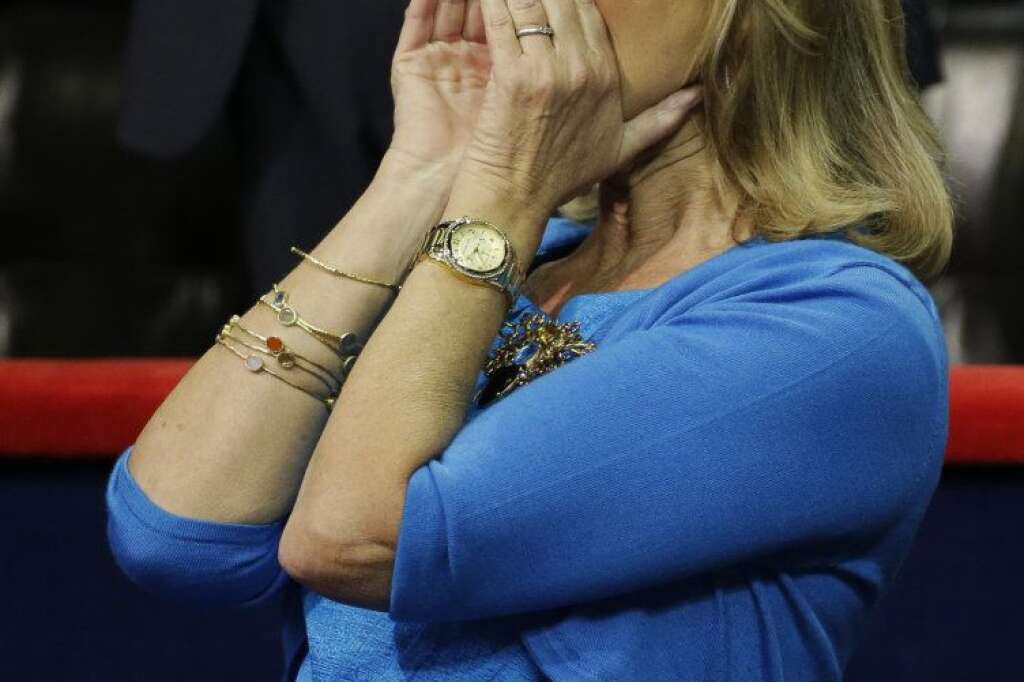 Ann Romney, wife of U.S. Republican presidential nominee Mitt Romney, cheers as Olympians are introduced during the Republican National Convention in Tampa, Fla., on Thursday, Aug. 30, 2012. (AP Photo/Charlie Neibergall)