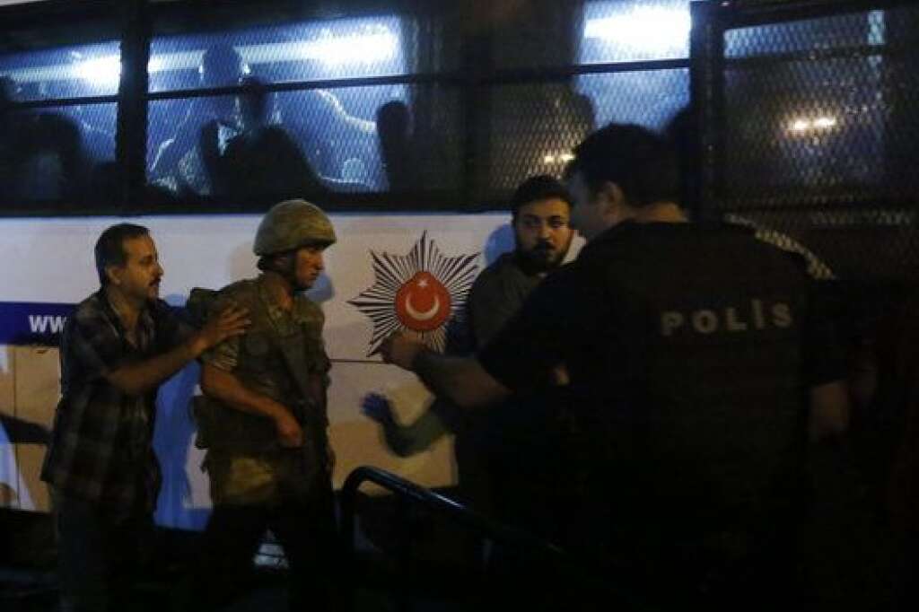 Turkish soldiers surrender to policemen during an attempted coup in Istanbul's Taksim Square, Turkey, July 16, 2016. REUTERS/Murad Sezer