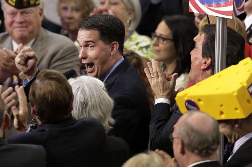 Scott Walker - Wisconsin Gov. Scott Walker reacts as he casts his states votes for former Massachusetts Gov. Mitt Romney during the Republican National Convention in Tampa, Fla., on Tuesday, Aug. 28, 2012. (AP Photo/J. Scott Applewhite)