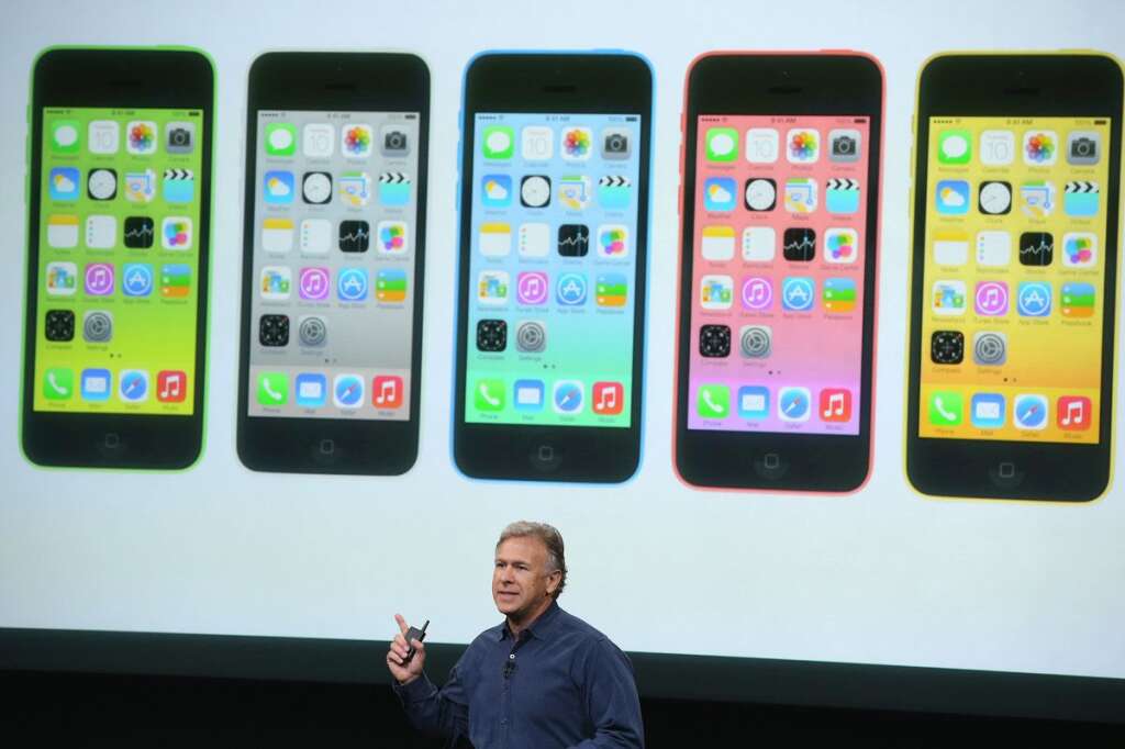 Keynote Apple - CUPERTINO, CA - SEPTEMBER 10:  Apple Senior Vice President of Worldwide Marketing at Phil Schiller speaks about the new iPhone 5C during an Apple product announcement at the Apple campus on September 10, 2013 in Cupertino, California. The company launched the new iPhone 5C model that will run iOS 7  is made from hard-coated polycarbonate and comes in various colors.  (Photo by Justin Sullivan/Getty Images)