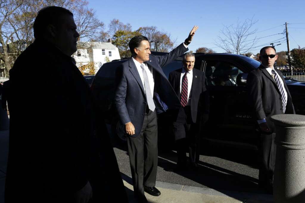 Mitt Romney - Republican presidential candidate, former Massachusetts Gov. Mitt Romney waves as he arrives at a polling station to vote in Belmont, Mass., Tuesday, Nov. 6, 2012. (AP Photo/Charles Dharapak)