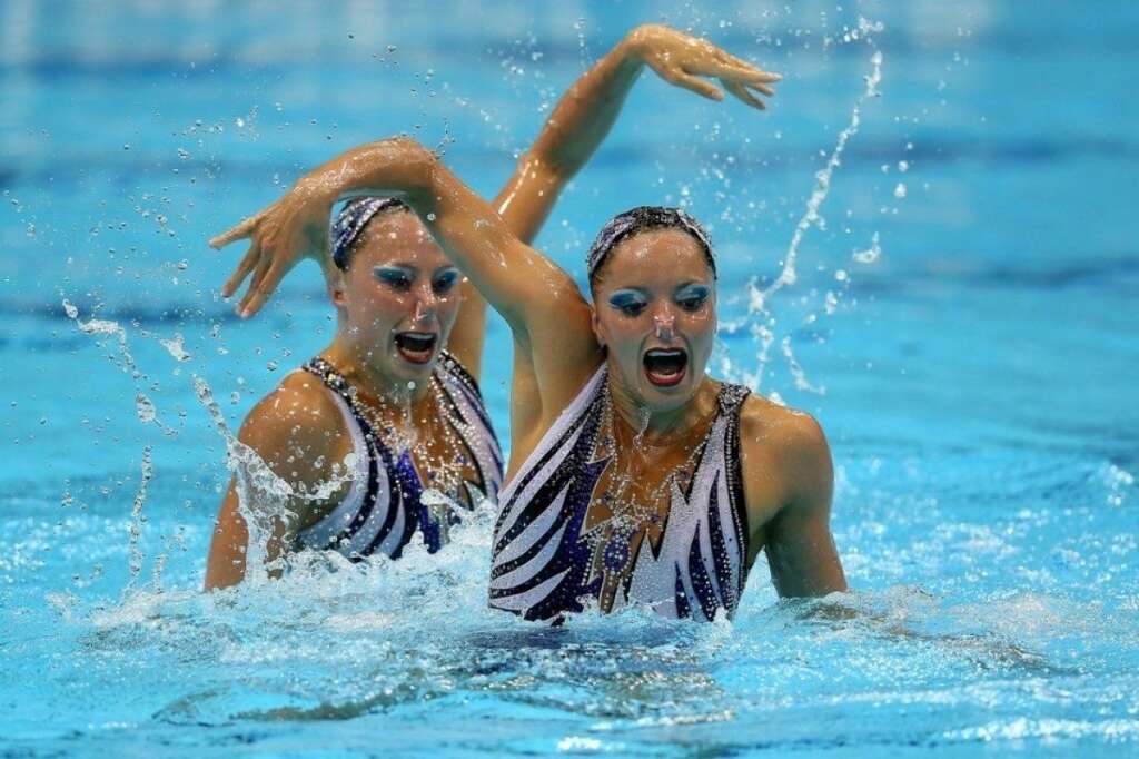 Les visages de la nage synchronisée - Les Françaises Sara Labrousse et Chloe Willhelm  (Clive Rose / Getty Images)