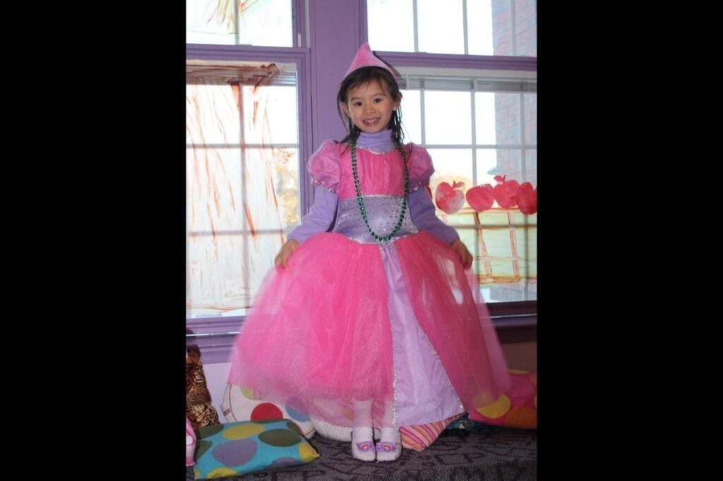 Cinderella - We're guessing she found her prince charming (or at least a whole bunch of candy) that night.  Cordelia, age 4.