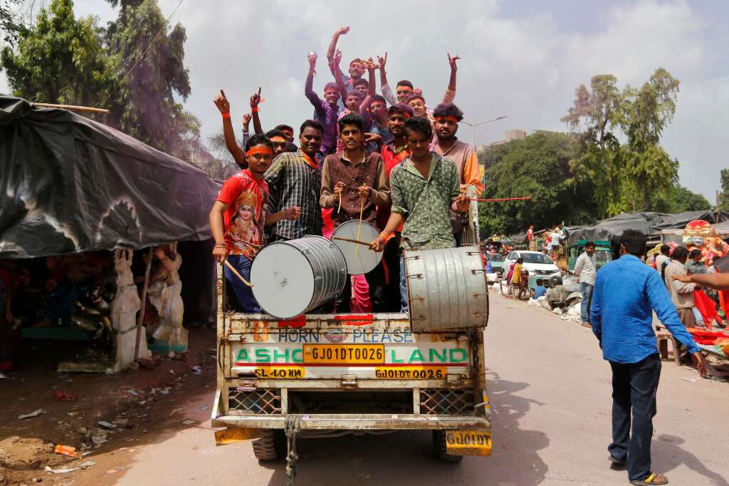 - Devotees play drums as they transport an idol of the Hindu god Ganesh, the deity of prosperity, to a place of worship on the first day of the Ganesh Chaturthi festival in Ahmedabad, India, September 5, 2016.