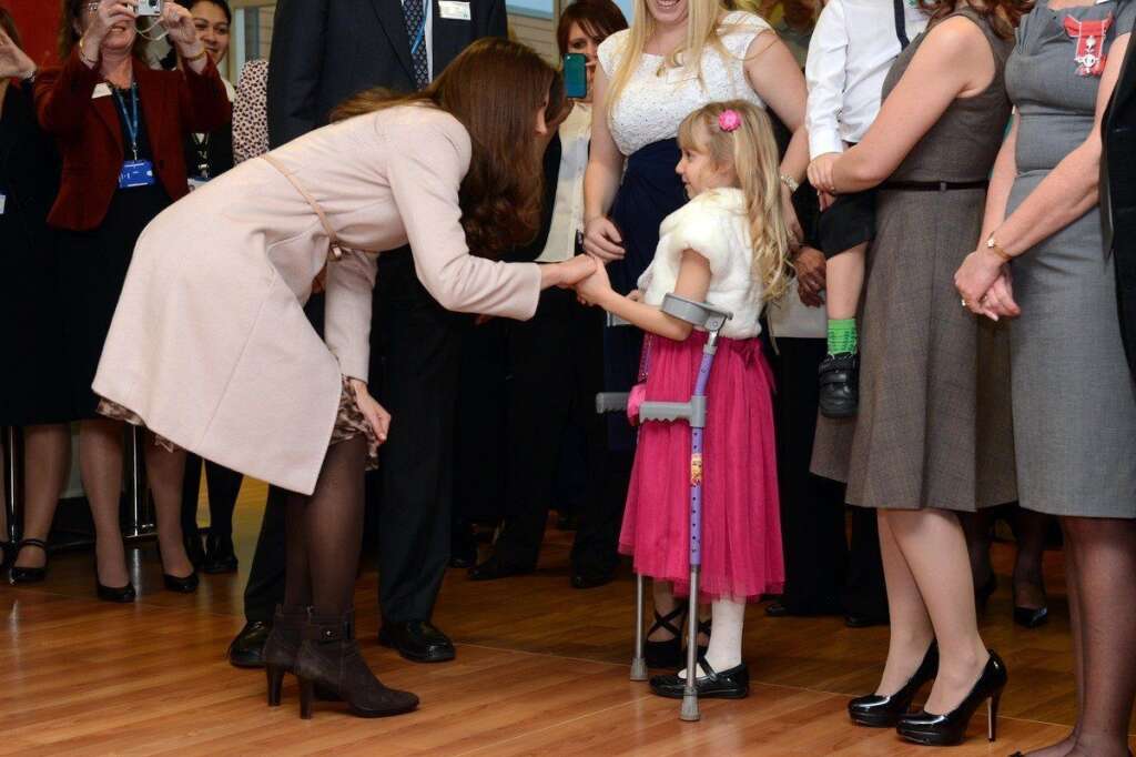 Royal visit to Cambridgeshire - The Duchess of Cambridge meets Emma Henson, 7, during a visit to Peterborough City Hospital in Cambridgeshire, as part of an official visit to Cambridge.