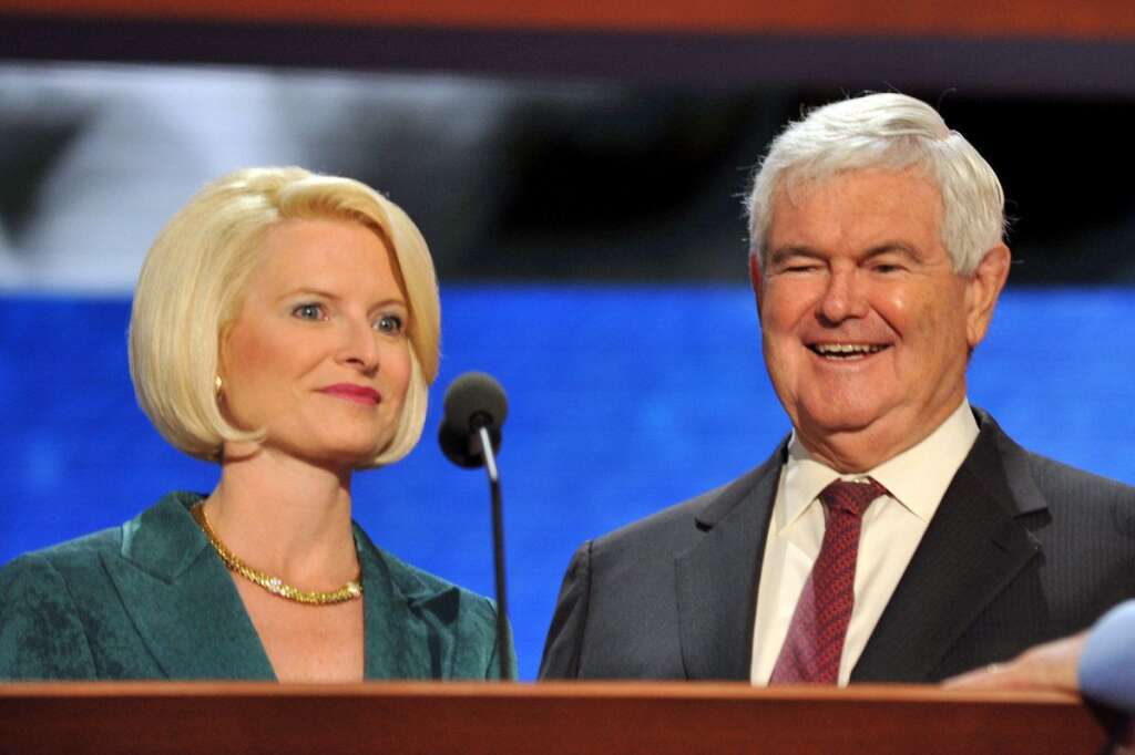 US-VOTE-2012-REPUBLICAN CONVENTION - Former republican presidential candidate Newt Gingrich and his wife Callista appear on stage during a sound check at the Tampa Bay Times Forum in Tampa, Florida, on August 28, 2012 during the Republican National Convention. The 2012 Republican National Convention is expected to host 2,286 delegates and 2,125 alternate delegates from all 50 states, the District of Columbia and five territories.      AFP PHOTO Stan HONDA        (Photo credit should read STAN HONDA/AFP/GettyImages)