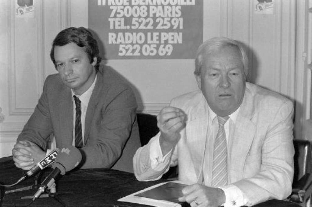 1983: le "tonnerre de Dreux" - Encore groupusculaire au début des années 80, le Front national débute son implantation à la faveur des élections municipales de 1983. Le numéro 2 du FN, Jean-Pierre Stirbois (ici à gauche), et sa femme Marie-France partent à la conquête de la ville de Dreux. Ils parviennent à sceller un accord avec la droite gaulliste dont la liste RPR-FN l'emportera au second tour.  C'est un coup de tonnerre qui marque le début de l'ascension du Front national, même si le numéro 2 du FN disparaîtra prématurément dans un accident de voiture.