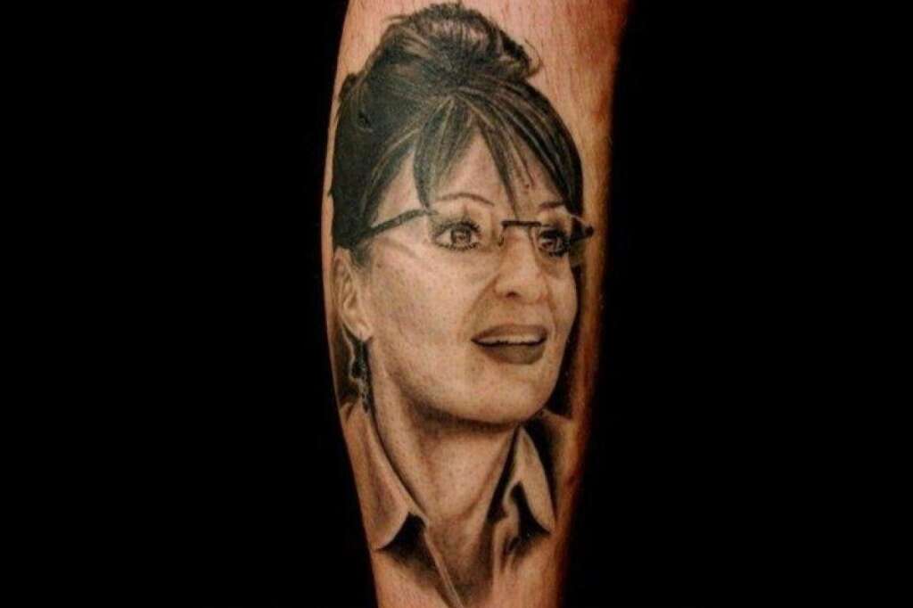 Sarah Palin, Part II - <a href="http://en.wikipedia.org/wiki/List_of_Governors_of_Alaska" target="_hplink">Alaska's third-most popular half-term governor</a> assumes her rightful place on your calf, where she'll stay forever.    <a href="http://ugliesttattoos.failblog.org/2011/07/15/funny-tattoos-unflippinbelievable/" target="_hplink"><em>(Ugliest Tattoos)</em></a>