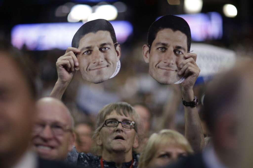 A delegate holds up a mask of Republican vice presidential nominee, Rep. Paul Ryan during the Republican National Convention in Tampa, Fla., on Wednesday, Aug. 29, 2012. (AP Photo/David Goldman)