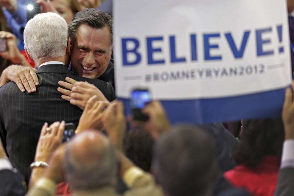 Mitt Romney - Republican presidential nominee Mitt Romney hugs a supporter as he walks to the stage during the Republican National Convention in Tampa, Fla., on Thursday, Aug. 30, 2012. (AP Photo/J. Scott Applewhite)