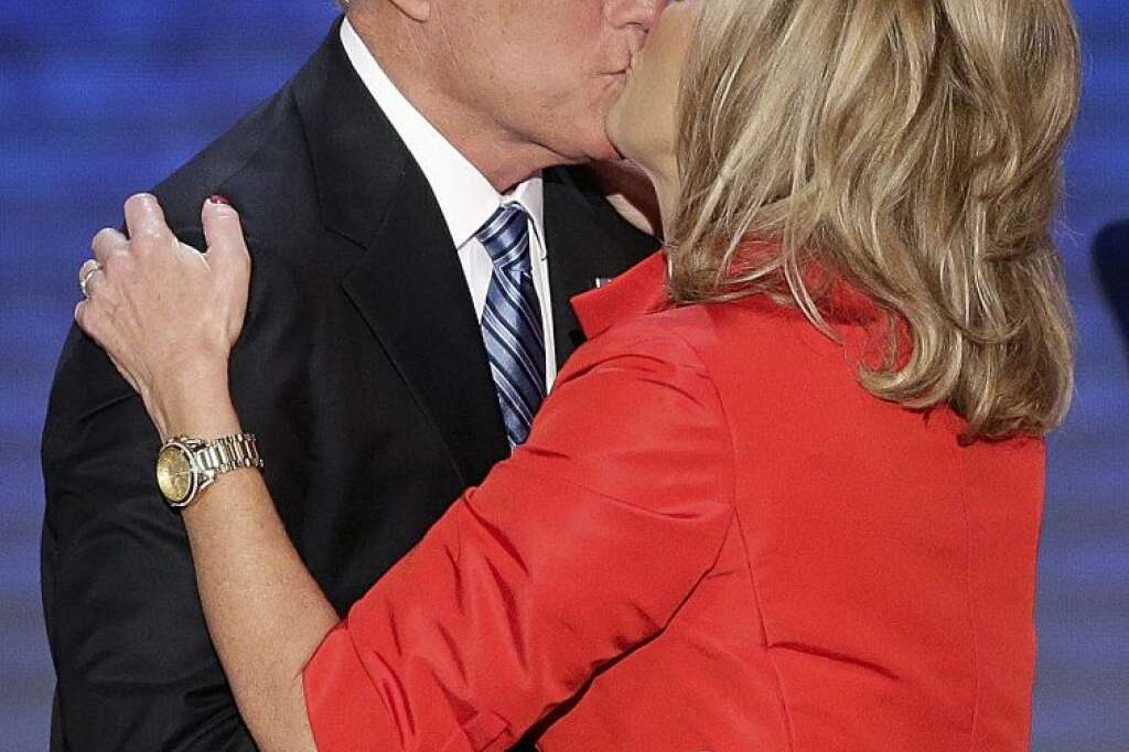 Mitt Romney, Ann Romney - Ann Romney is kissed by her husband Republican presidential nominee Mitt Romney during the Republican National Convention in Tampa, Fla. on Tuesday, Aug. 28, 2012. (AP Photo/J. Scott Applwhite)